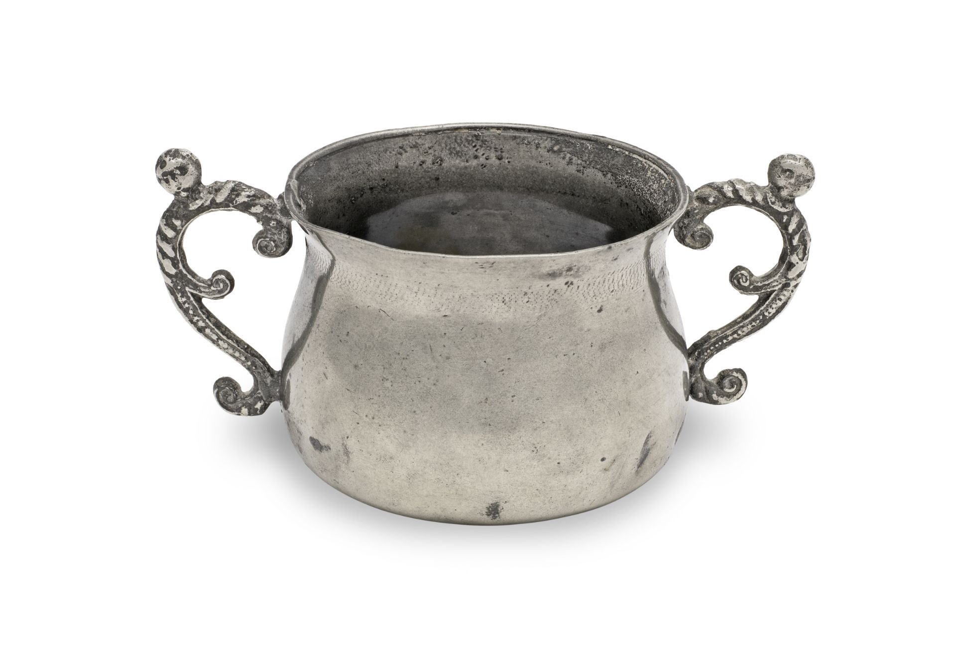 A rare, fine and documented Charles II pewter two-handled caudle or posset cup, circa 1660
