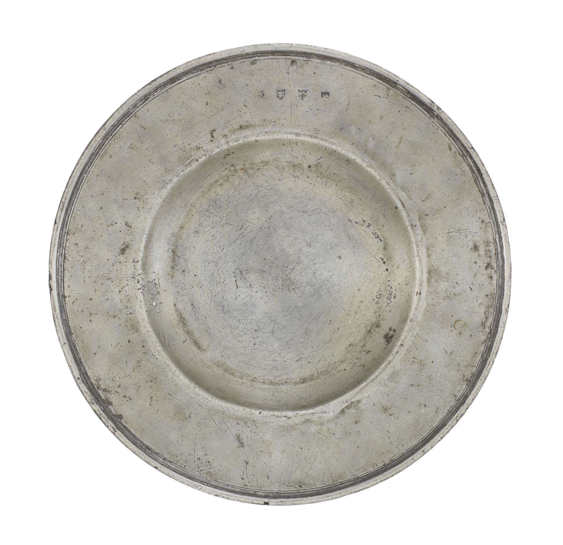 A rare and documented Charles II pewter broad rim and reeded-edge plate, circa 1660