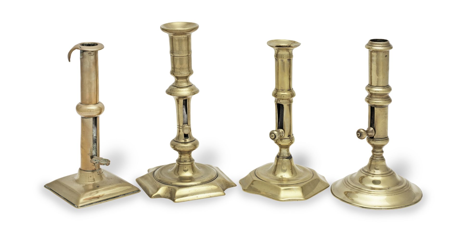 Four 18th century brass ejector candlesticks, English (4)