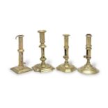 Four 18th century brass ejector candlesticks, English (4)