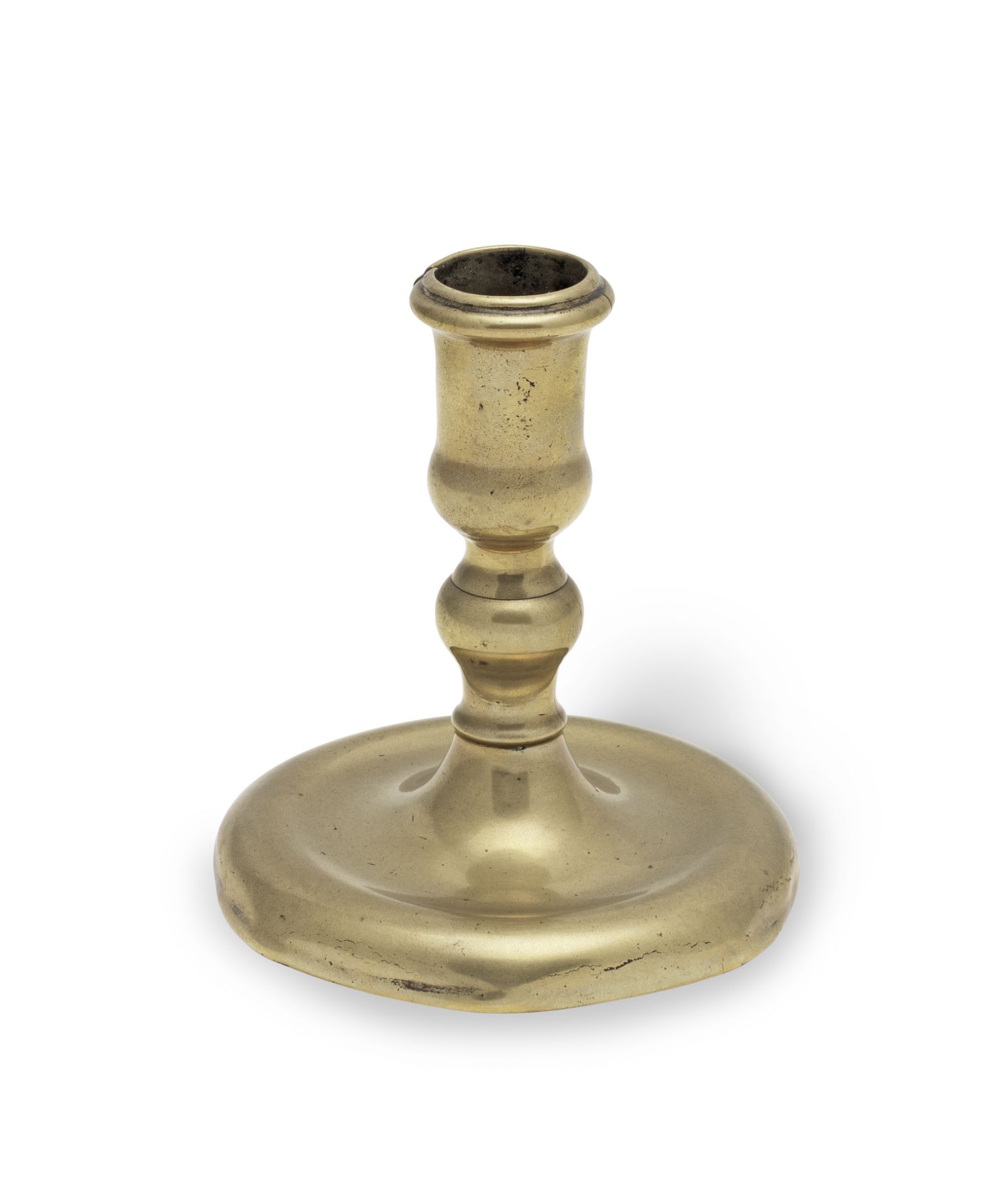 A rare early 18th century brass dwarf socket candlestick, circa 1700-20 Possibly from a toilet se...