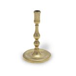 A George II brass taperstick, circa 1730