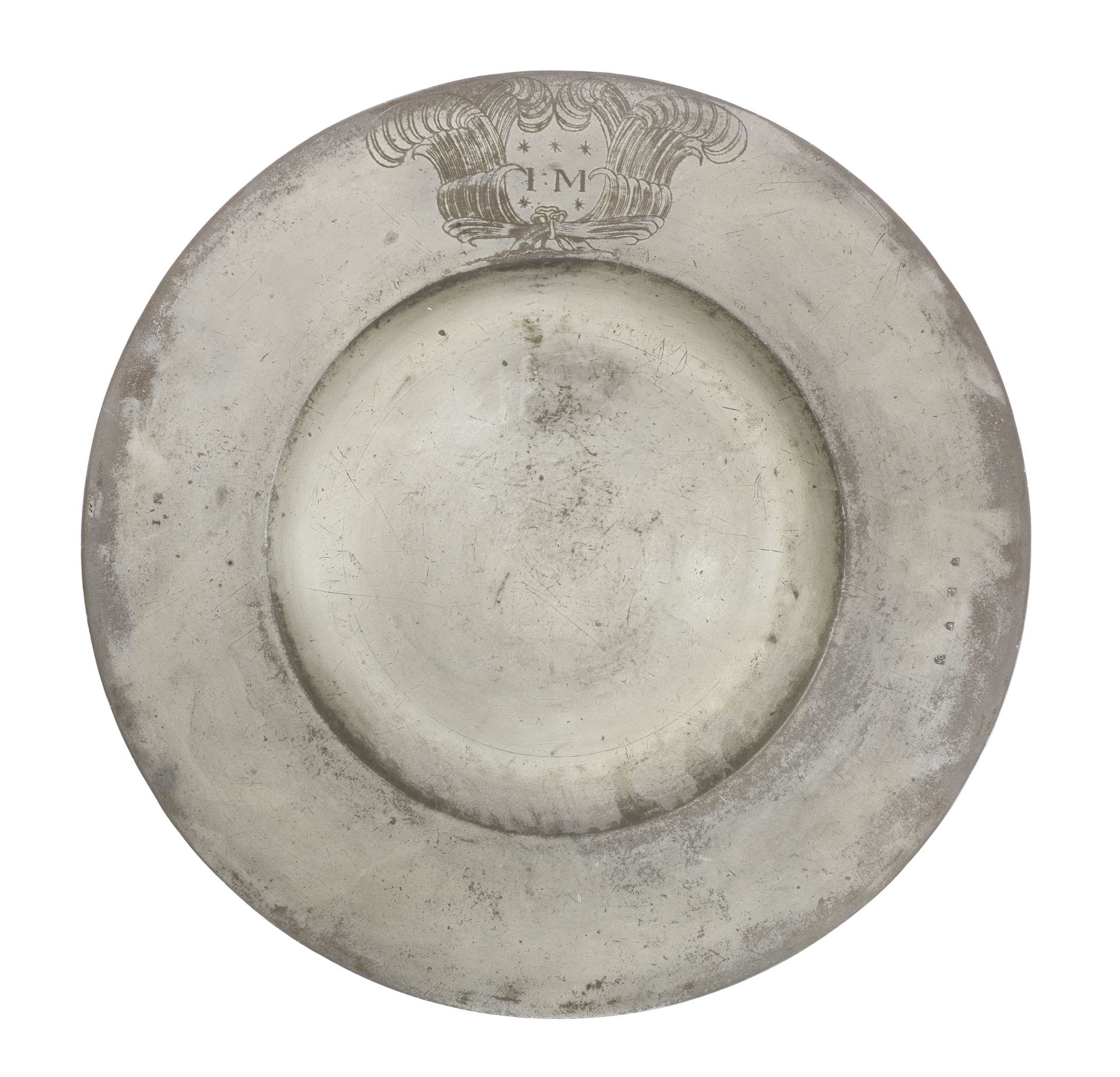 An extremely fine Charles II pewter broad rim charger, circa 1660