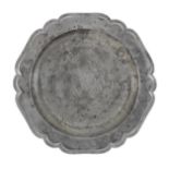 An unusual George II pewter six lobed wavy-edge plate, circa 1745