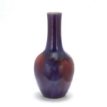 A LARGE FLAMB&#201;-GLAZED BOTTLE VASE 19th century