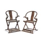 A MATCHED PAIR OF JICHIMU AND HARDWOOD HORSESHOE-BACK FOLDING ARMCHAIRS Late Qing Dynasty and lat...