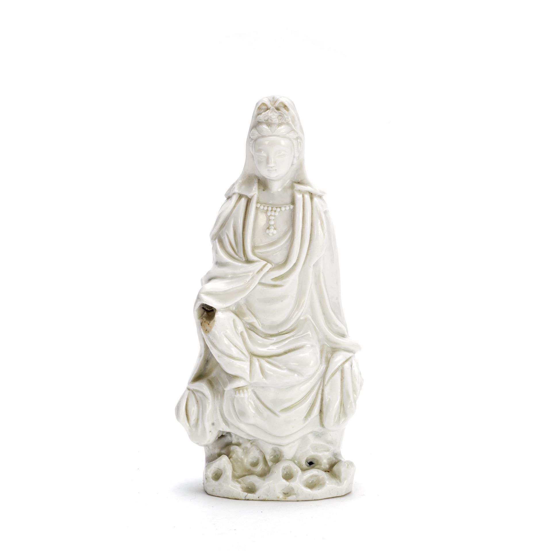 A BLANC-DE-CHINE FIGURE OF GUANYIN 17th century