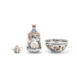AN IMARI BOWL, A SAKE BOTTLE AND A TEAPOT AND COVER 18th to 19th century (4)