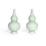 A PAIR OF CELADON GLAZED DOUBLE GOURD VASES 19th century (2)