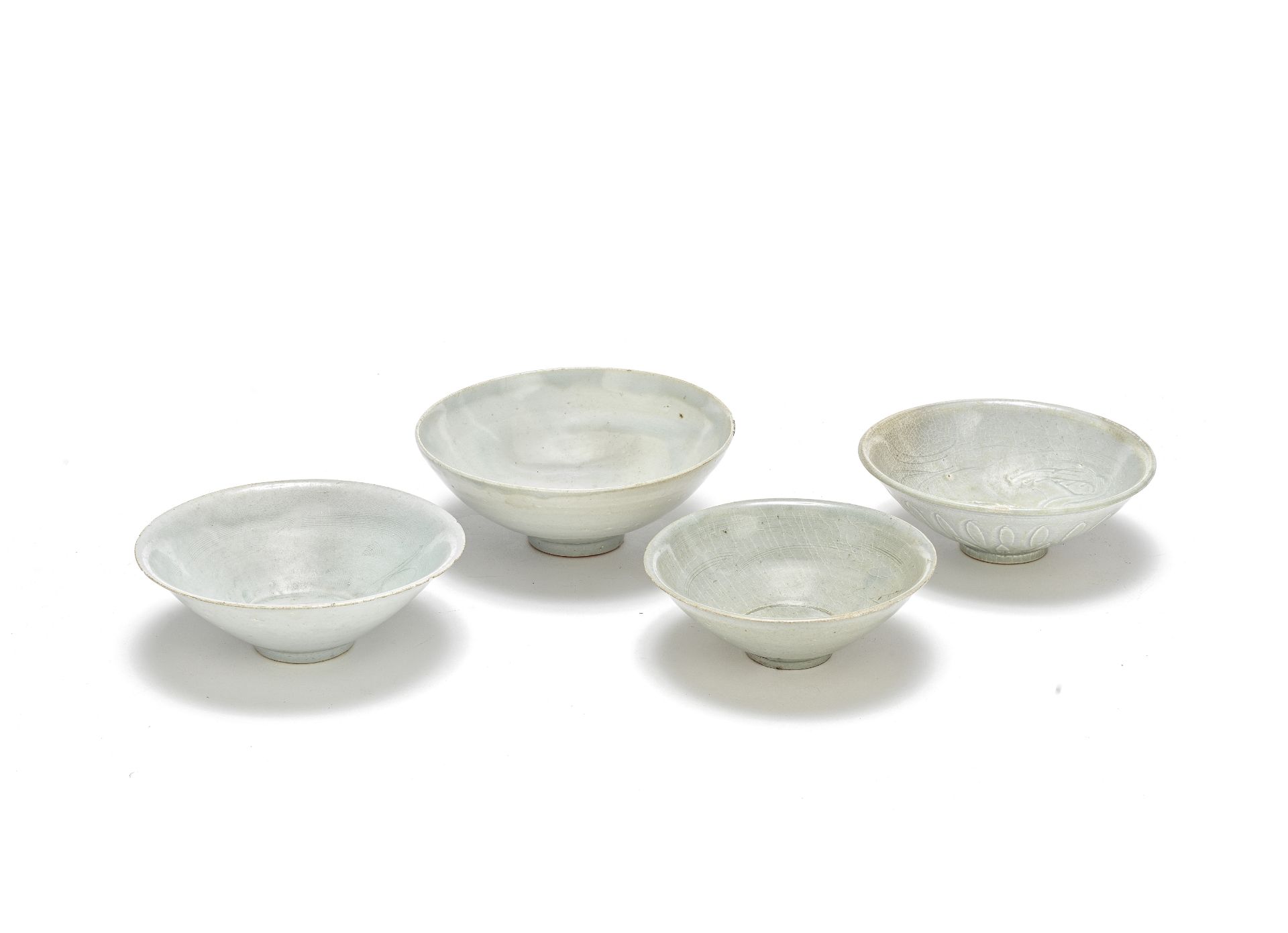 A GROUP OF FOUR QINGBAI BOWLS Song/Yuan Dynasty (4)