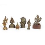 A SELECTION OF SIX VARIOUSLY BRONZE AND GILT BRONZE BUDDHIST FIGURES India, Tibet and China, 19th...