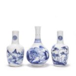 A BLUE AND WHITE 'KYLIN' BOTTLE VASE AND A RELATED PAIR OF VASES Kangxi and 18th/19th century