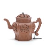 A YIXING ZISHA RETICULATED TEAPOT AND COVER 18th century, seal mark of Chen Jinghou