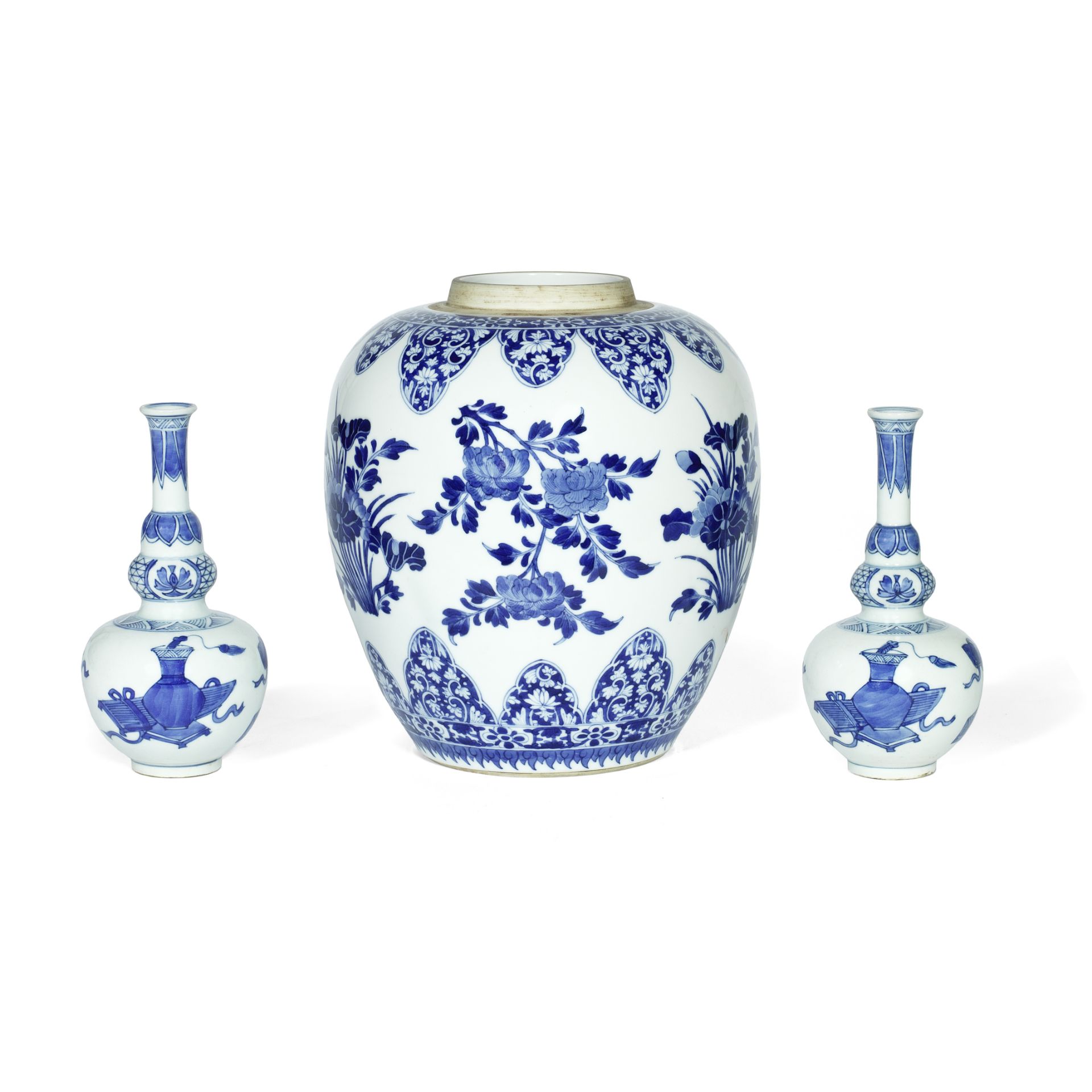 A BLUE AND WHITE FLORAL JAR AND A PAIR OF TRIPLE GOURD VASES Kangxi (3)