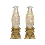 A LARGE PAIR OF CANTON FAMILLE ROSE VASES 19th century (4)