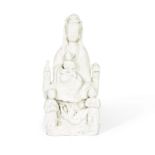 A BLANC-DE-CHINE GUANYIN GROUP 17th/18th century