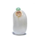 A PALE GREEN AND RUSSET JADE 'PEBBLE' SNUFF BOTTLE Late Qing Dynasty (2)