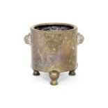 A GOLD-SPLASHED BRONZE CYLINDRICAL TRIPOD INCENSE BURNER Xuande four-character seal mark, 17th/18...