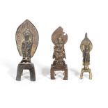 A GROUP OF THREE NORTHERN WEI-STYLE BRONZE FIGURES OF BUDDHA Late Qing Dynasty (3)