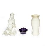 A BLANC-DE-CHINE FIGURE OF GUANYIN, A SOFT-PASTE VASE AND AN AUBERGINE-GLAZED WATER POT Kangxi to...