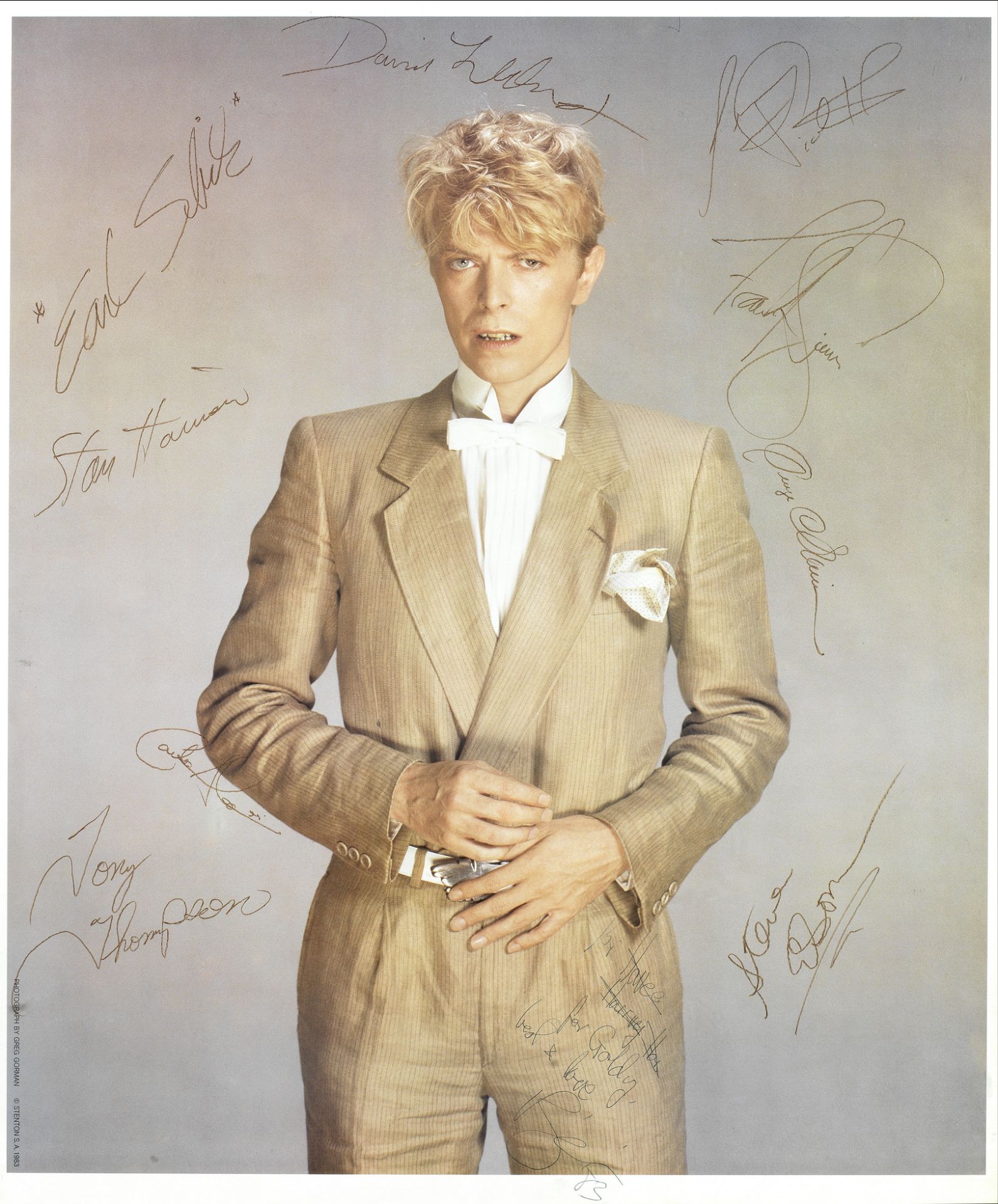 David Bowie: A large signed portrait poster of David Bowie, 1983,