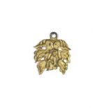 A RARE GILT-BRONZE LEAF-SHAPED HORSE-HARNESS PENDANT Tang Dynasty