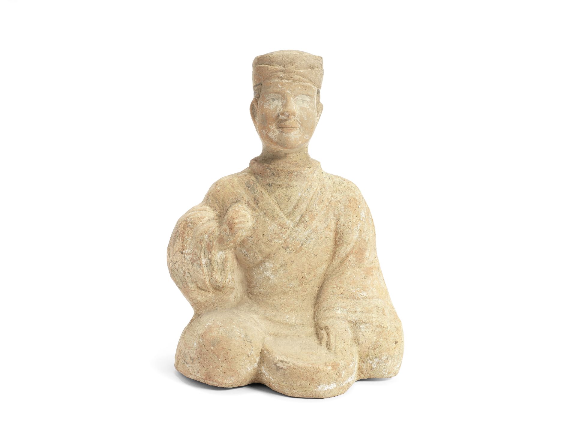 A LARGE POTTERY FIGURE OF A DRUMMER Eastern Han Dynasty