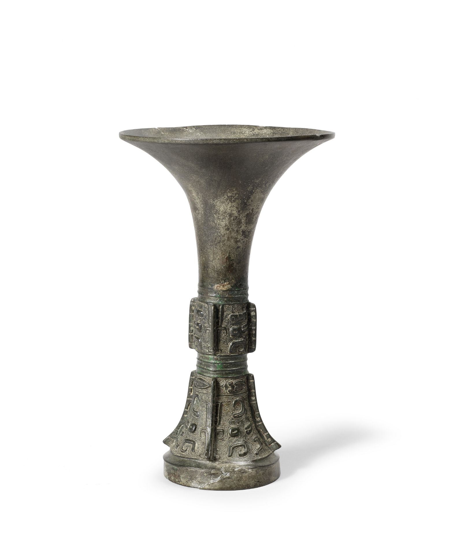 A RARE ARCHAIC BRONZE RITUAL WINE VESSEL, GU Late Shang Dynasty