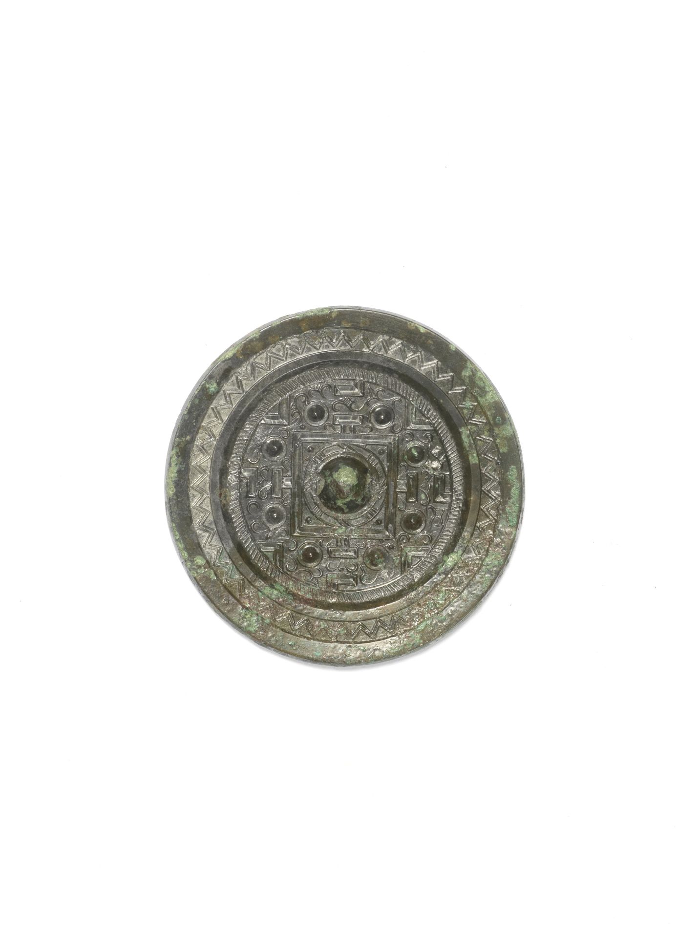 A BRONZE CIRCULAR 'TLV' MIRROR Han Dynasty