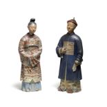 A PAIR OF PAINTED PLASTER 'NODDING HEAD' FIGURES OF AN OFFICIAL AND LADY Qianlong/Jiaqing (4)