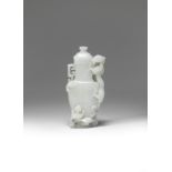 A RARE VERY PALE GREEN JADE 'DRAGON AND YOUNG' VASE AND COVER Qianlong (3)