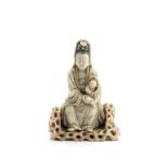 A SOAPSTONE FIGURE OF GUANYIN AND CHILD Kangxi (2)