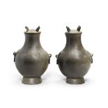 A PAIR OF BRONZE RITUAL WINE VESSELS AND COVERS, HU Han Dynasty (4)