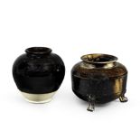A BLACK-GLAZED RUSSET-SPLASHED TRIPOD INCENSE BURNER AND A BLACK-GLAZED JAR Tang Dynasty (2)