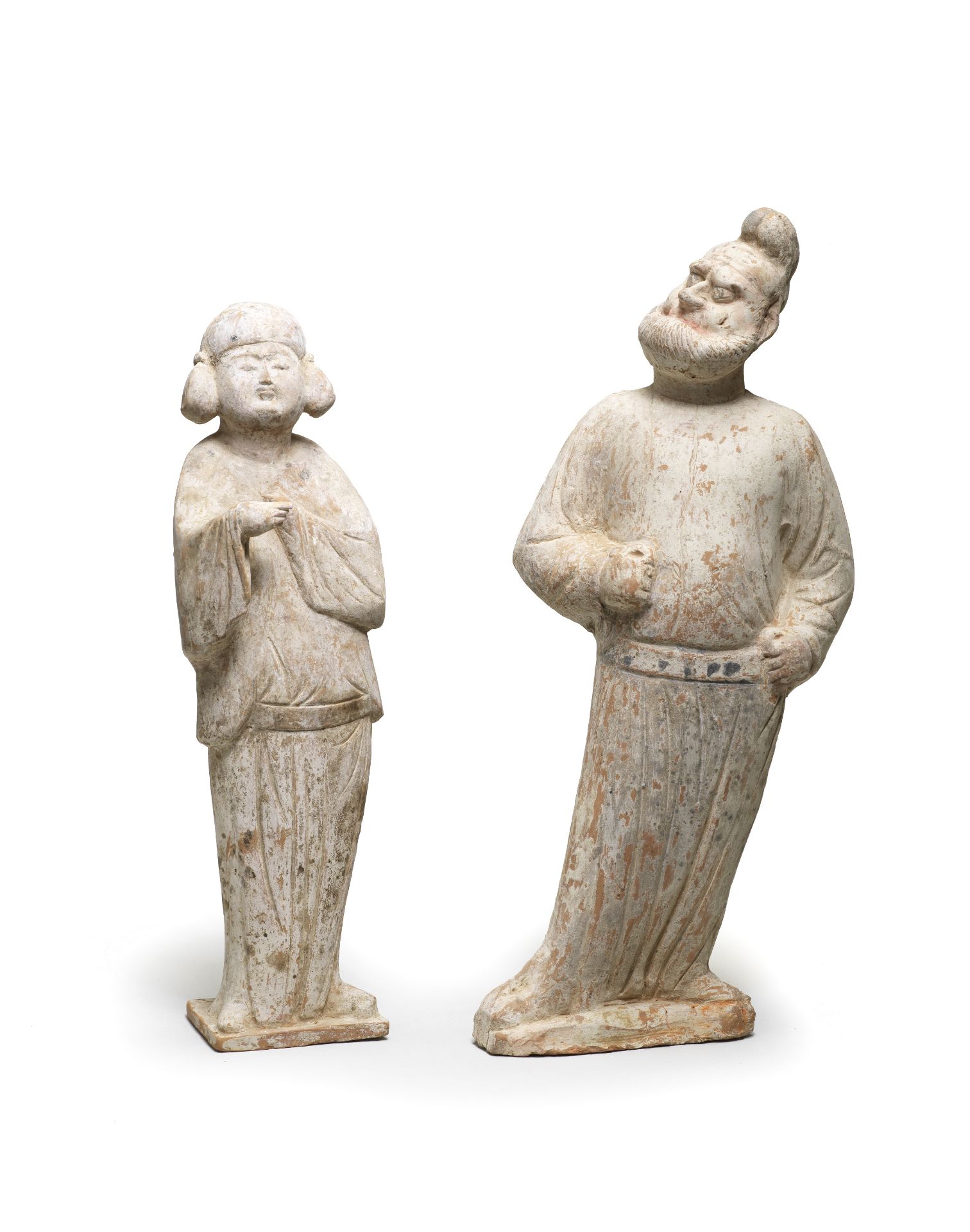 TWO PAINTED POTTERY FIGURES OF A GROOM AND A COURT LADY Tang Dynasty (2)