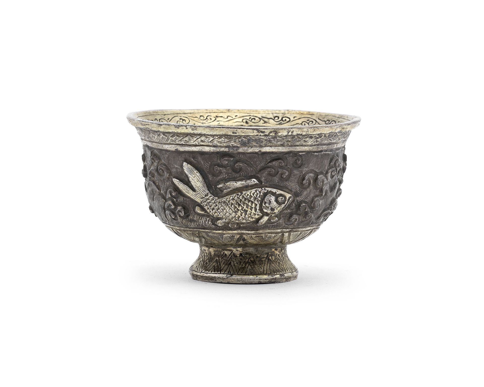 A RARE PARCEL-GILT SILVER-ALLOY REPOUSS&#201; CUP Song Dynasty