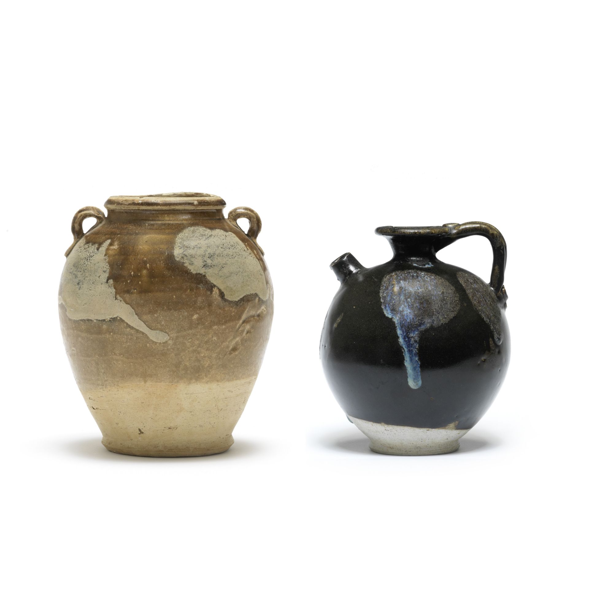 A PHOSPHATIC-SPLASHED BLACK-GLAZED EWER Tang Dynasty