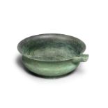 A BRONZE POURING VESSEL, YI Tang Dynasty