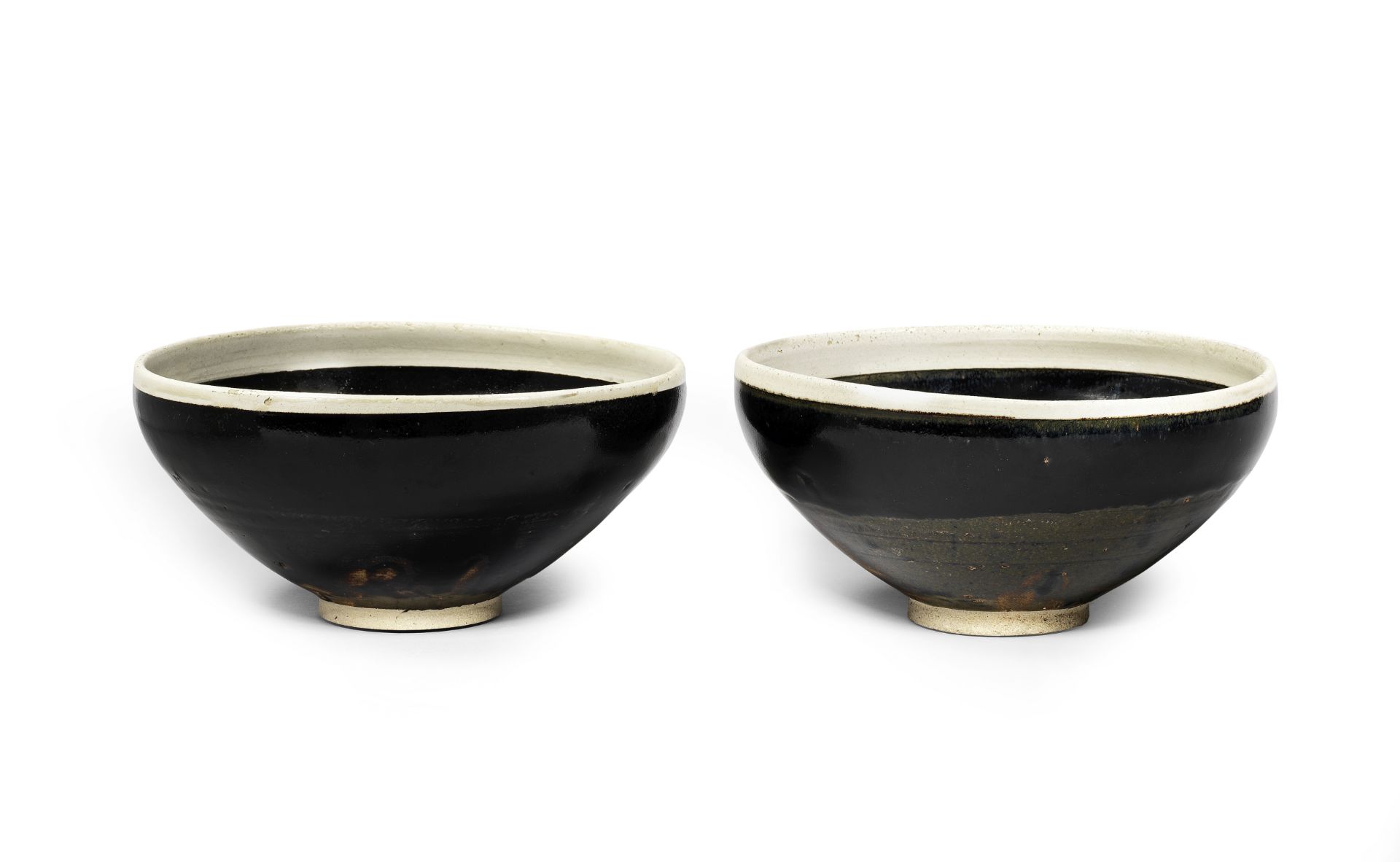 A PAIR OF BLACK-GLAZED WHITE-RIMMED BOWLS Song/Jin Dynasty (3)