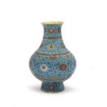 A LARGE CLOISONN&#201; ENAMEL AND GILT-BRONZE PEAR-SHAPED VASE, HU Late Ming Dynasty