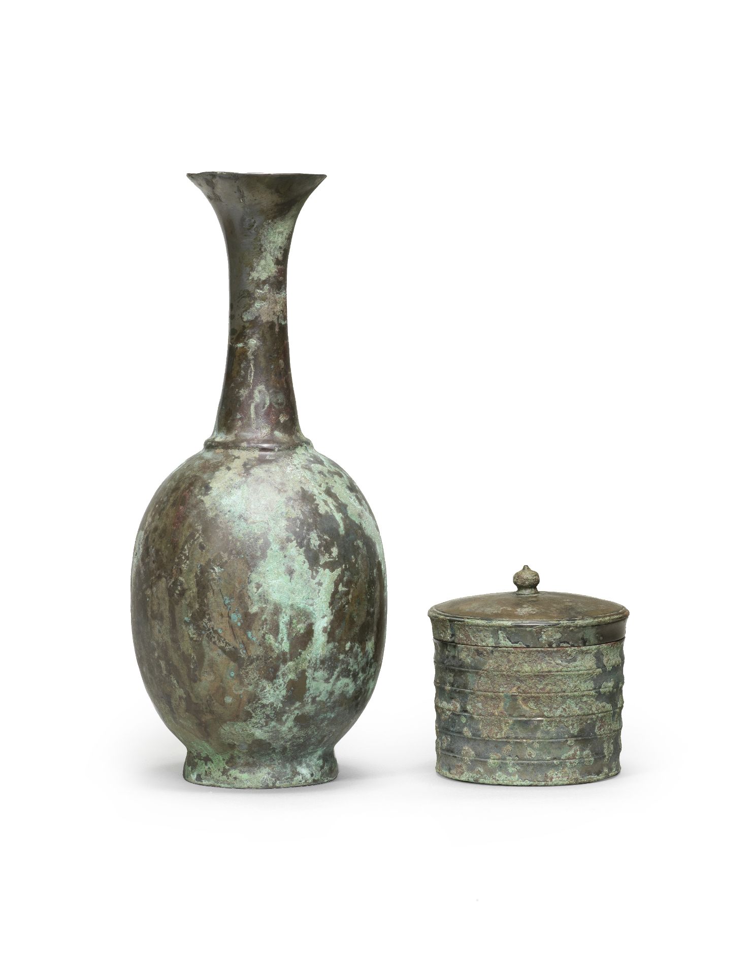 A BRONZE RIBBED BOX AND COVER AND A BRONZE BOTTLE VASE Tang Dynasty (3)