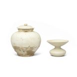 A CREAM-GLAZED ZHADOU AND A CREAM-GLAZED JAR AND COVER Tang Dynasty (2)