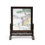 A RARE AND LARGE PAINTED ENAMEL 'EUROPEAN SUBJECT' DOUBLE-SIDED SCREEN Qianlong, the zitan stand ...