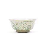 A RARE CAF&#201;-AU-LAIT-GROUND FAMILLE ROSE 'ORCHID' BOWL Daoguang seal mark and of the period