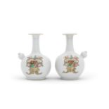 A RARE PAIR OF ARMORIAL KENDI FOR THE DUTCH MARKET 18th century (2)