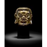 A RARE AND LARGE GILT-BRONZE HEAD OF A GUARDIAN Yuan/early Ming Dynasty (2)