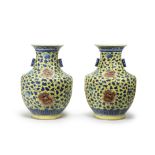 A PAIR OF LARGE YELLOW-GROUND IRON-RED AND GREEN-ENAMELLED BLUE AND WHITE VASES, HU Guangxu six-c...