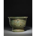 A VERY RARE ARCHAIC BRONZE FOOD VESSEL, YU Late Shang Dynasty, 13th-12th century BC