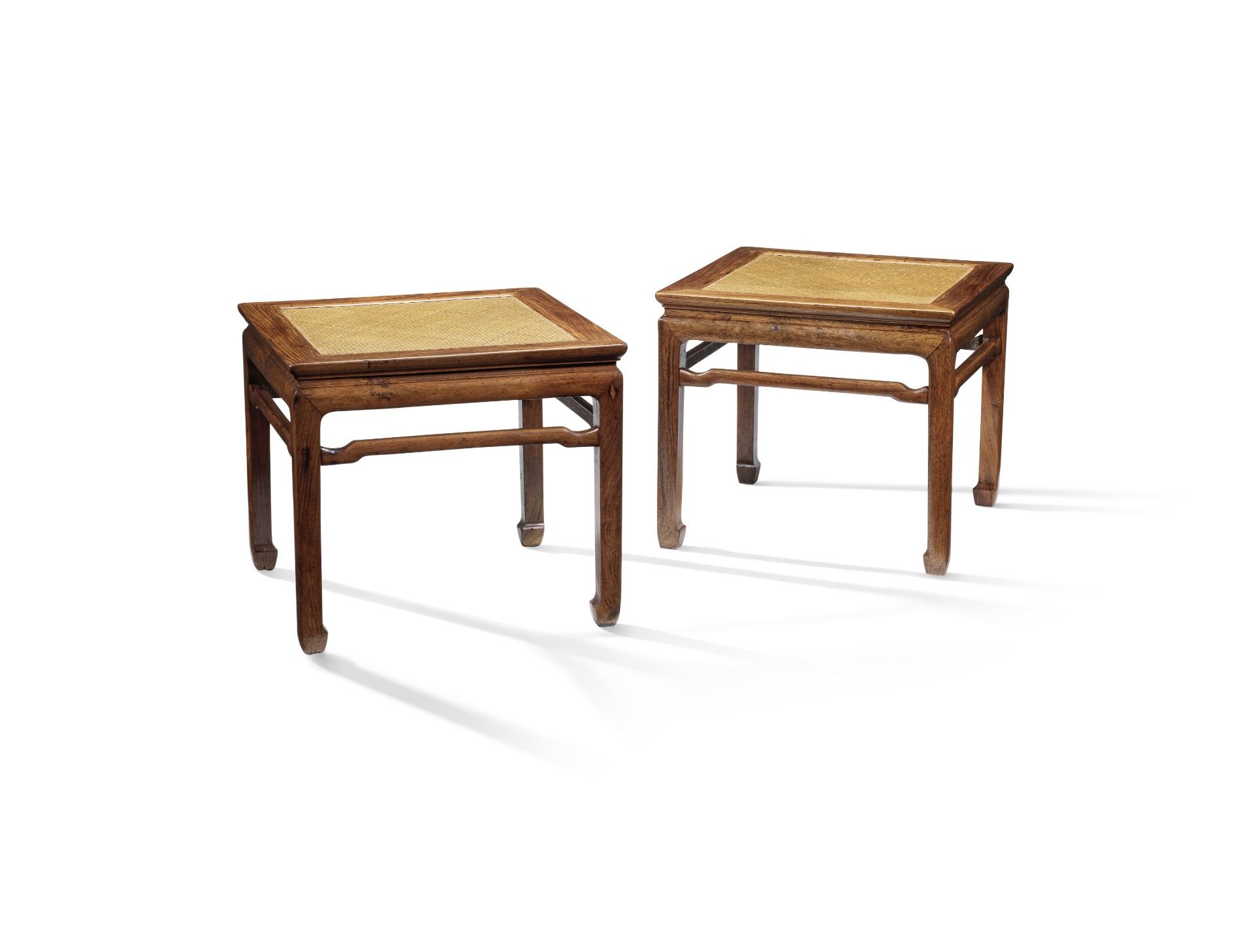 A FINE PAIR OF HUANGHUALI RECTANGULAR WAISTED CORNER-LEG STOOLS, FANGDENG 17th/18th century (2)