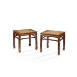 A RARE PAIR OF HUANGHUALI WAISTED CORNER-LEG STOOLS, FANGDENG 17th century (2)